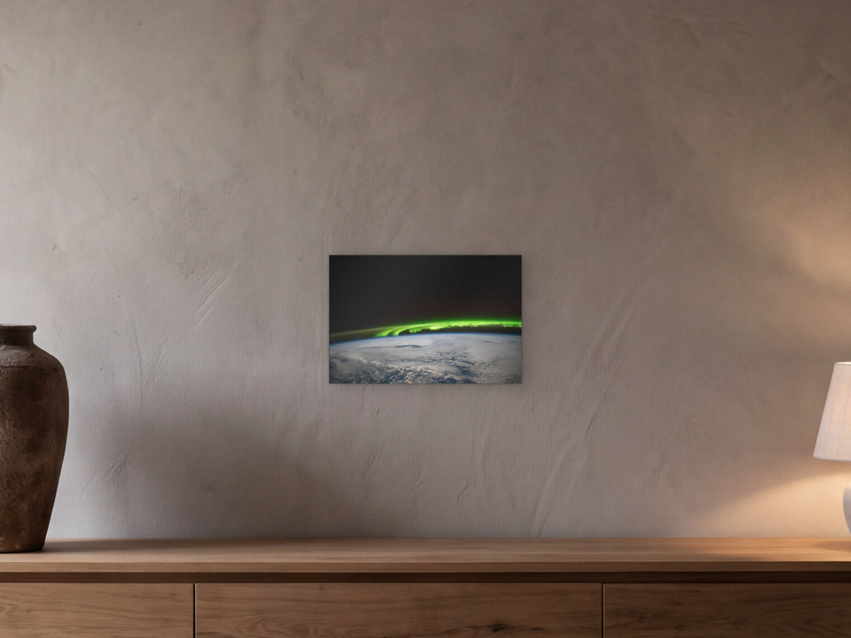 Aurora over the North Pacific shown in a beamed room with a greige plaster wall above a long oak sideboard - scale render at 45 × 30 cm