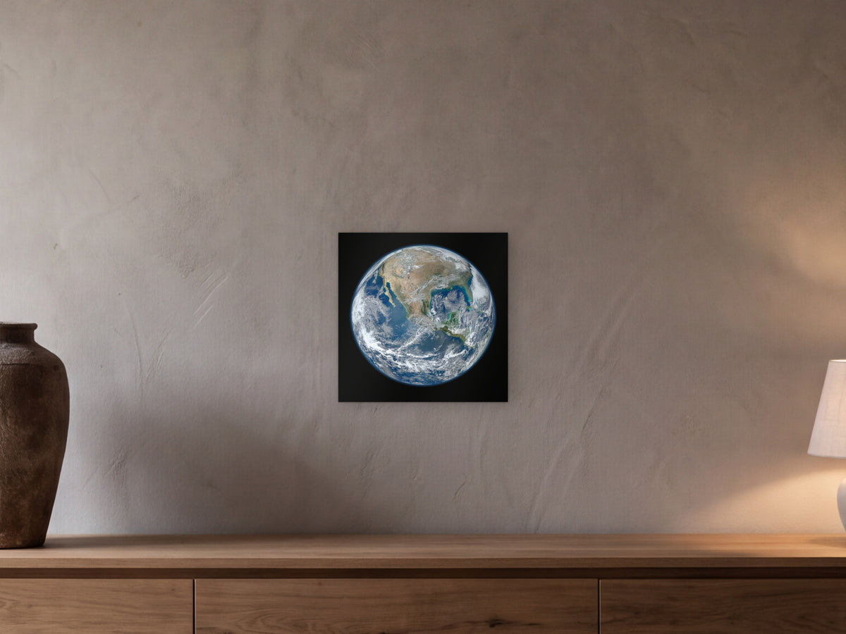 Blue Marble 2012 - Western Hemisphere shown in a beamed room with a greige plaster wall above a long oak sideboard - scale render at 40 × 40 cm