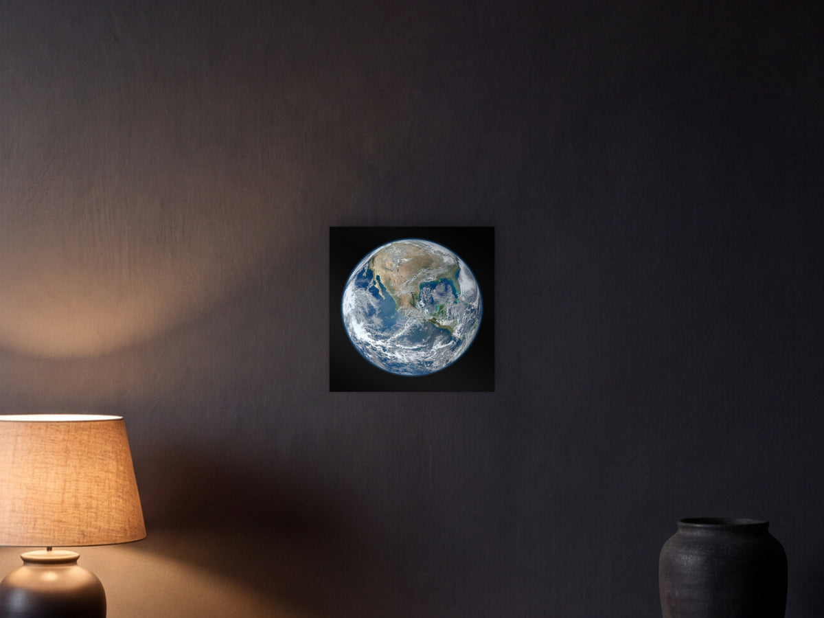 Blue Marble 2012 - Western Hemisphere shown in a graphite plaster wall at night, lit by a console lamp - scale render at 40 × 40 cm