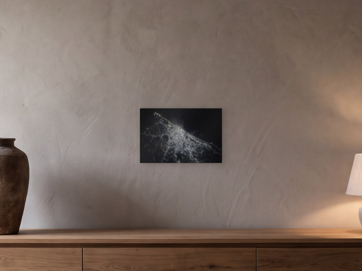 Chennai City Lights shown in a beamed room with a greige plaster wall above a long oak sideboard - scale render at 45 × 30 cm