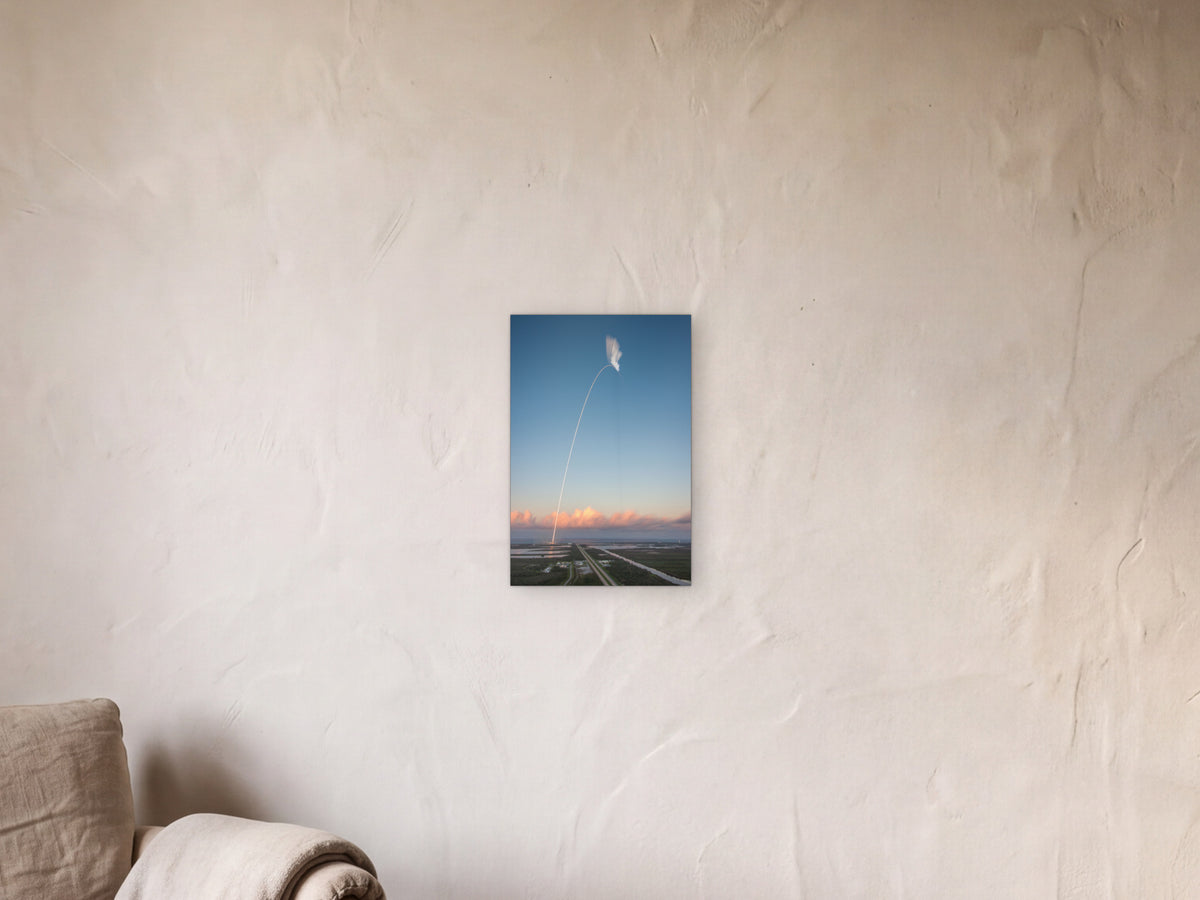 The Long Arc shown in a limewash reading corner beside an armchair and a floor lamp - scale render at 30 × 45 cm