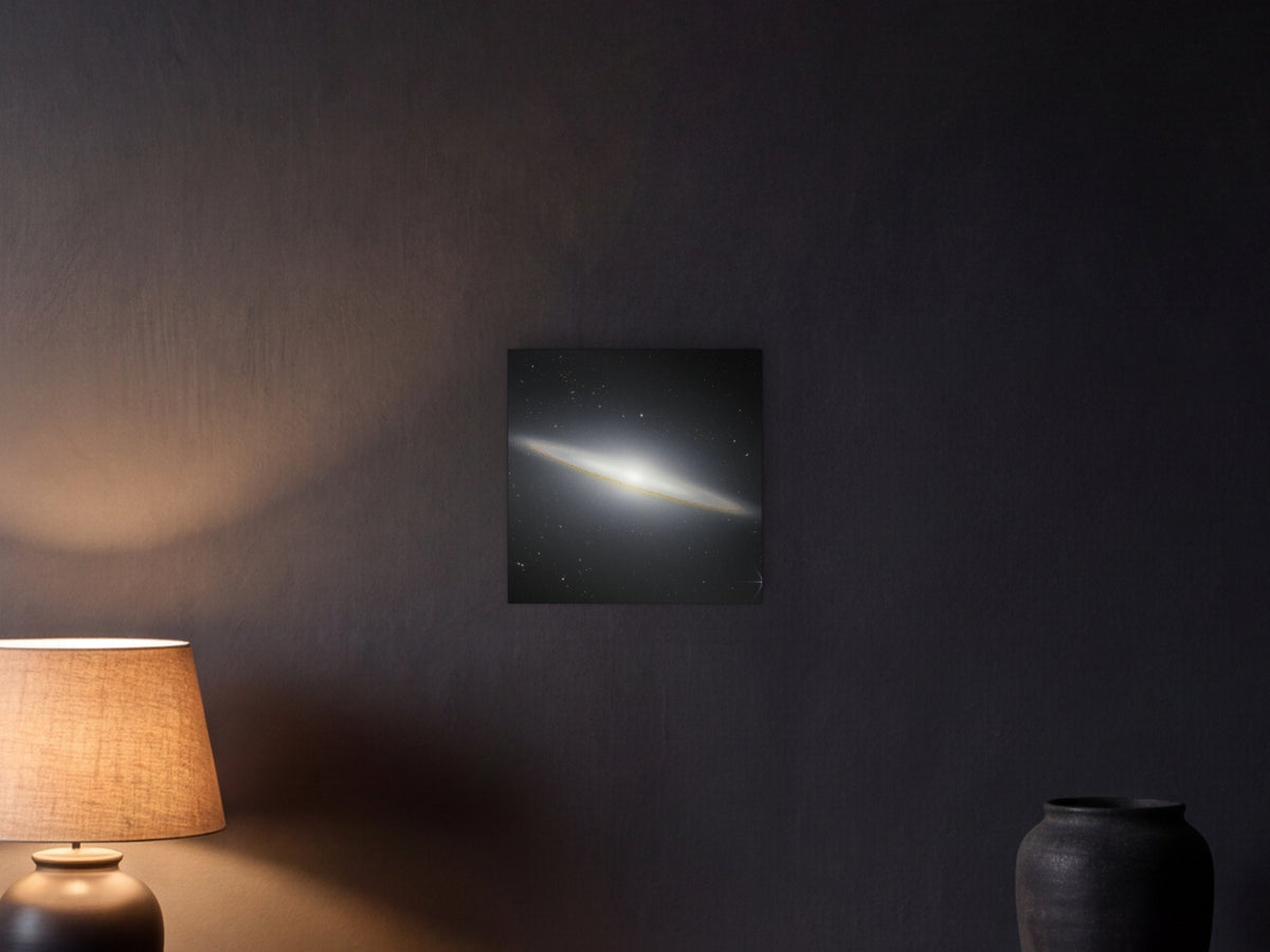 Sombrero Galaxy in Near-Infrared shown in a graphite plaster wall at night, lit by a console lamp - scale render at 40 × 40 cm